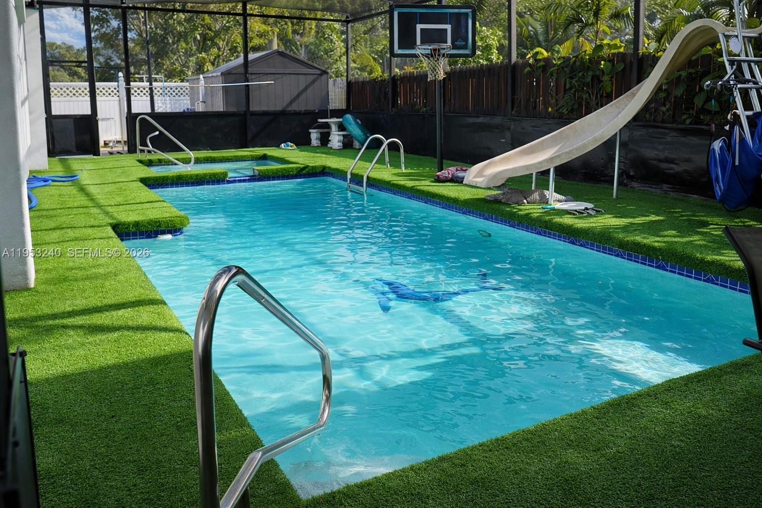 480 Northeast 109th Street Miami, FL 33161 - Photo 4 of 5 a view of a house with a backyard