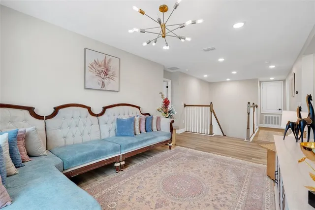 a workspace with furniture and wooden floor