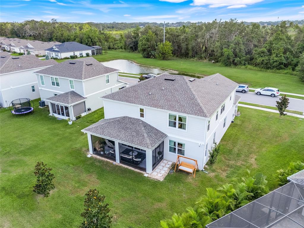 10169 Spring Lake Drive Clermont, FL 34711 - Photo 42 of 54 an aerial view of a house with garden