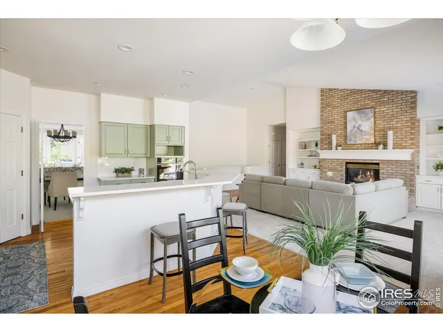 a kitchen with a table and chairs in it