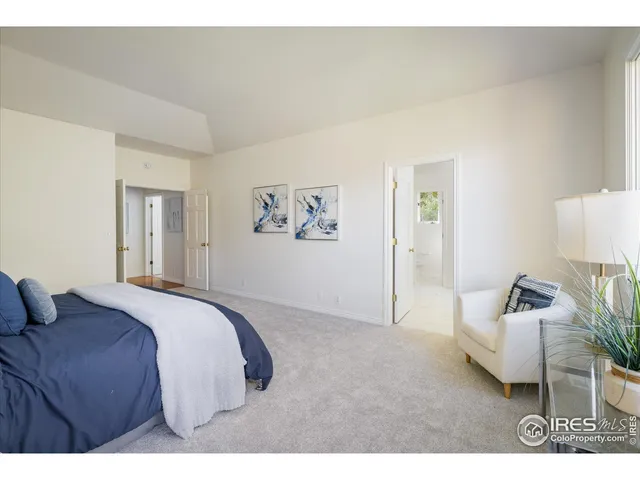 a bedroom with a bed and furniture