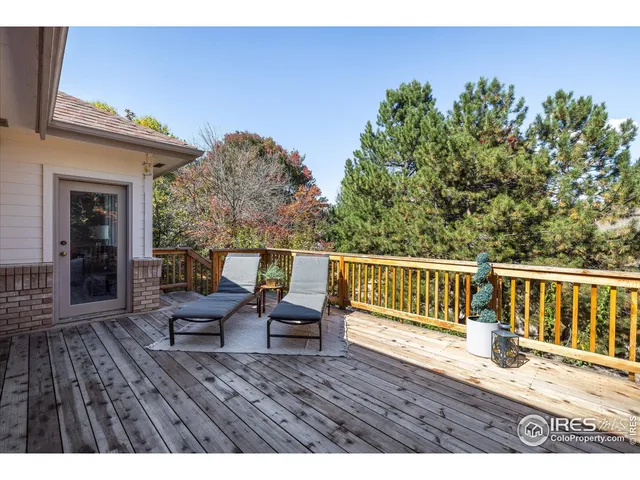 a view of sitting area on roof with furniture