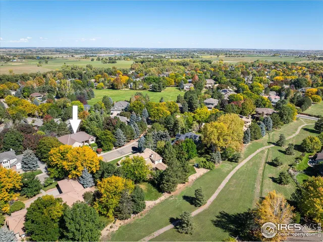 a view of a city with mountains in the background