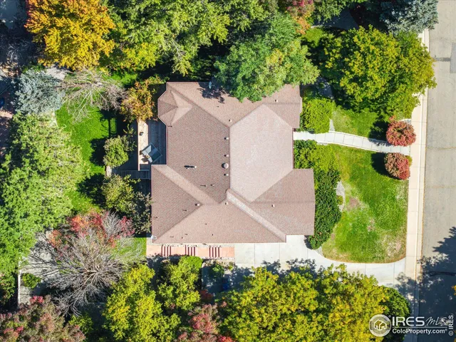 an aerial view of a house with a garden