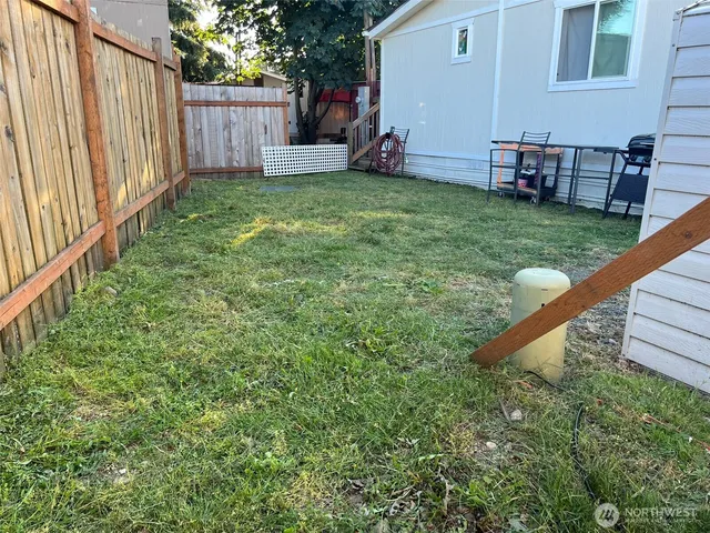 a view of a backyard with a garden