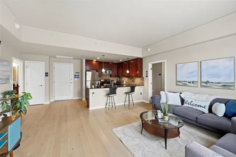 an aerial view of city and lake