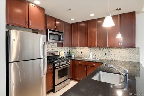 a bedroom with a bed and dresser