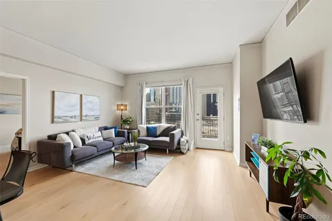 a kitchen with granite countertop stainless steel appliances and wooden cabinets