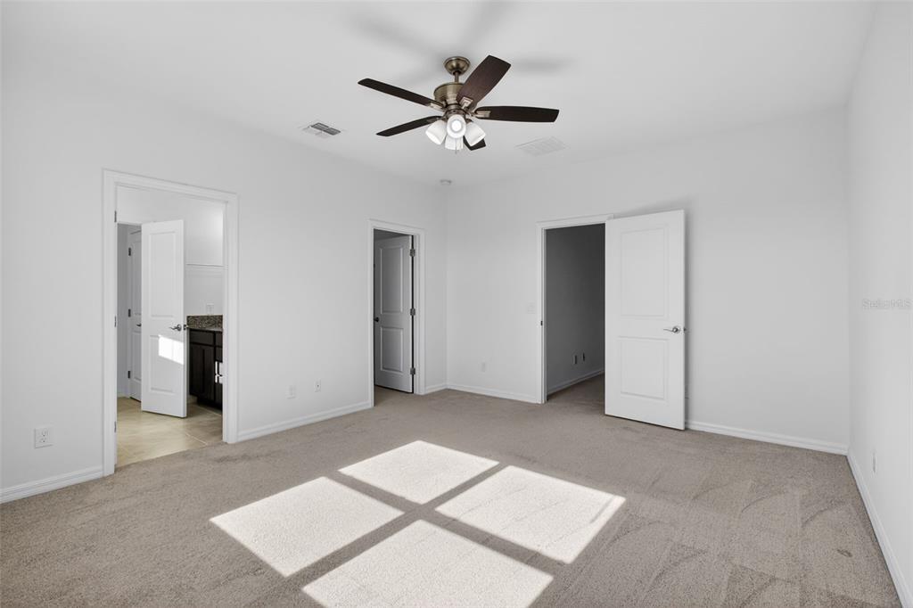 810 MIDDLETON Street DeBary, FL 32713 - Photo 23 of 52 a view of an empty room with a ceiling fan