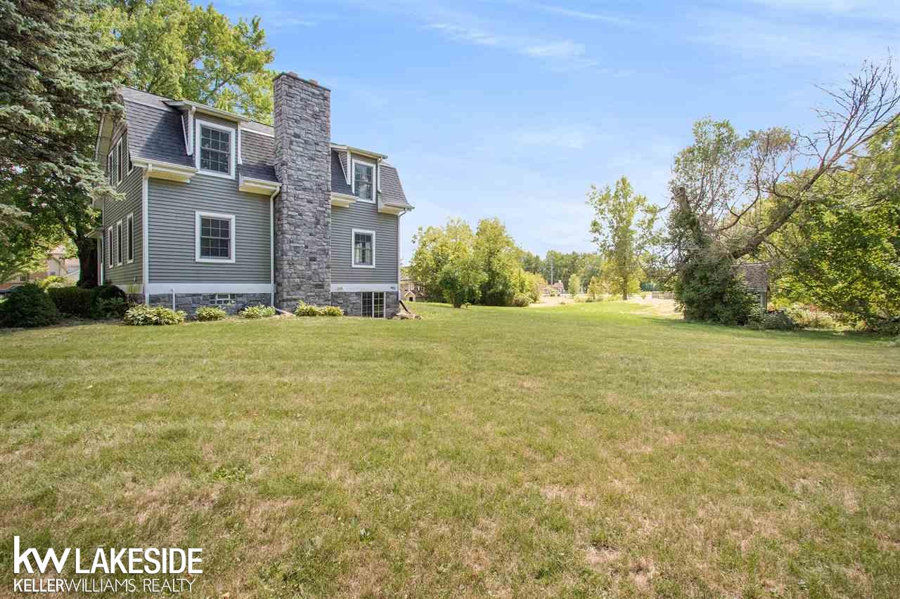 34344 Armada Ridge Road Richmond, MI 48062 - Photo 11 of 36 Here is the side of the home.