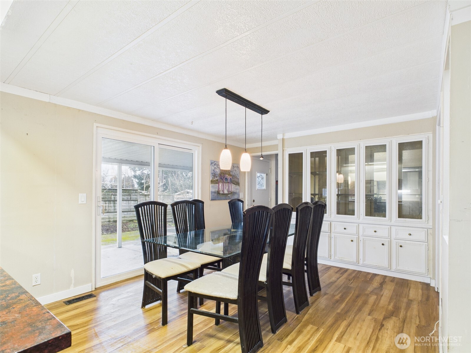 201 Union Avenue Southeast, Unit 183 Renton, WA 98059 - Photo 13 of 30 a view of a dining room with furniture window and wooden floor