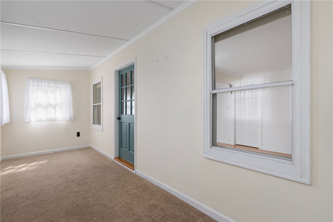 37 Reservoir Road Middletown, RI 02842 - Photo 8 of 39 Enclosed Front Porch