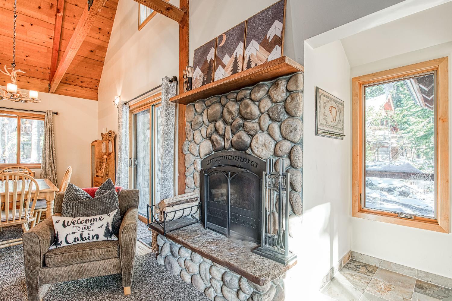 55578 Cordwood Road Shaver Lake, CA 93664 - Photo 11 of 59 a view of living room with furniture and a fireplace