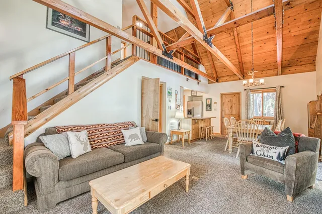 a view of a living room with a large window