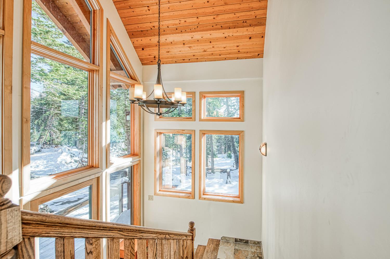 55578 Cordwood Road Shaver Lake, CA 93664 - Photo 13 of 59 a view of a living room with a large window