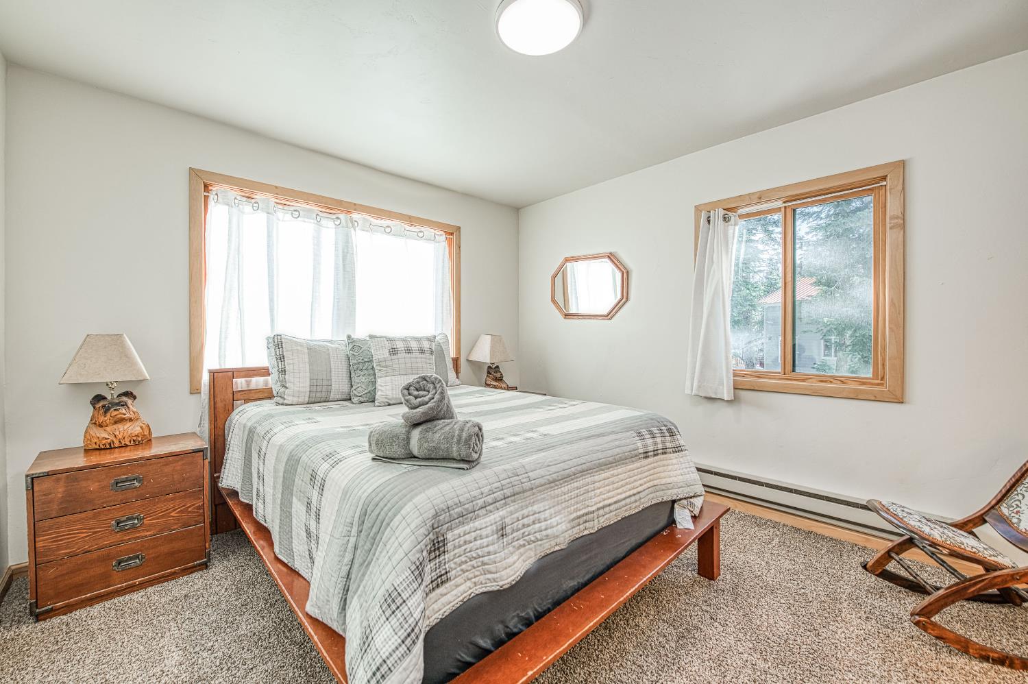55578 Cordwood Road Shaver Lake, CA 93664 - Photo 17 of 59 a bedroom with a bed and a window