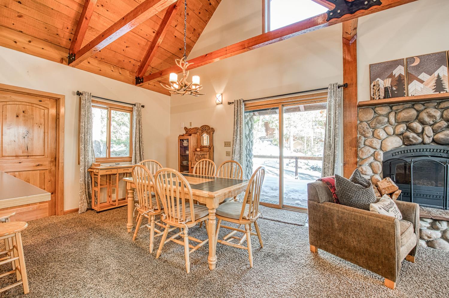 55578 Cordwood Road Shaver Lake, CA 93664 - Photo 2 of 59 a dining room with furniture and window