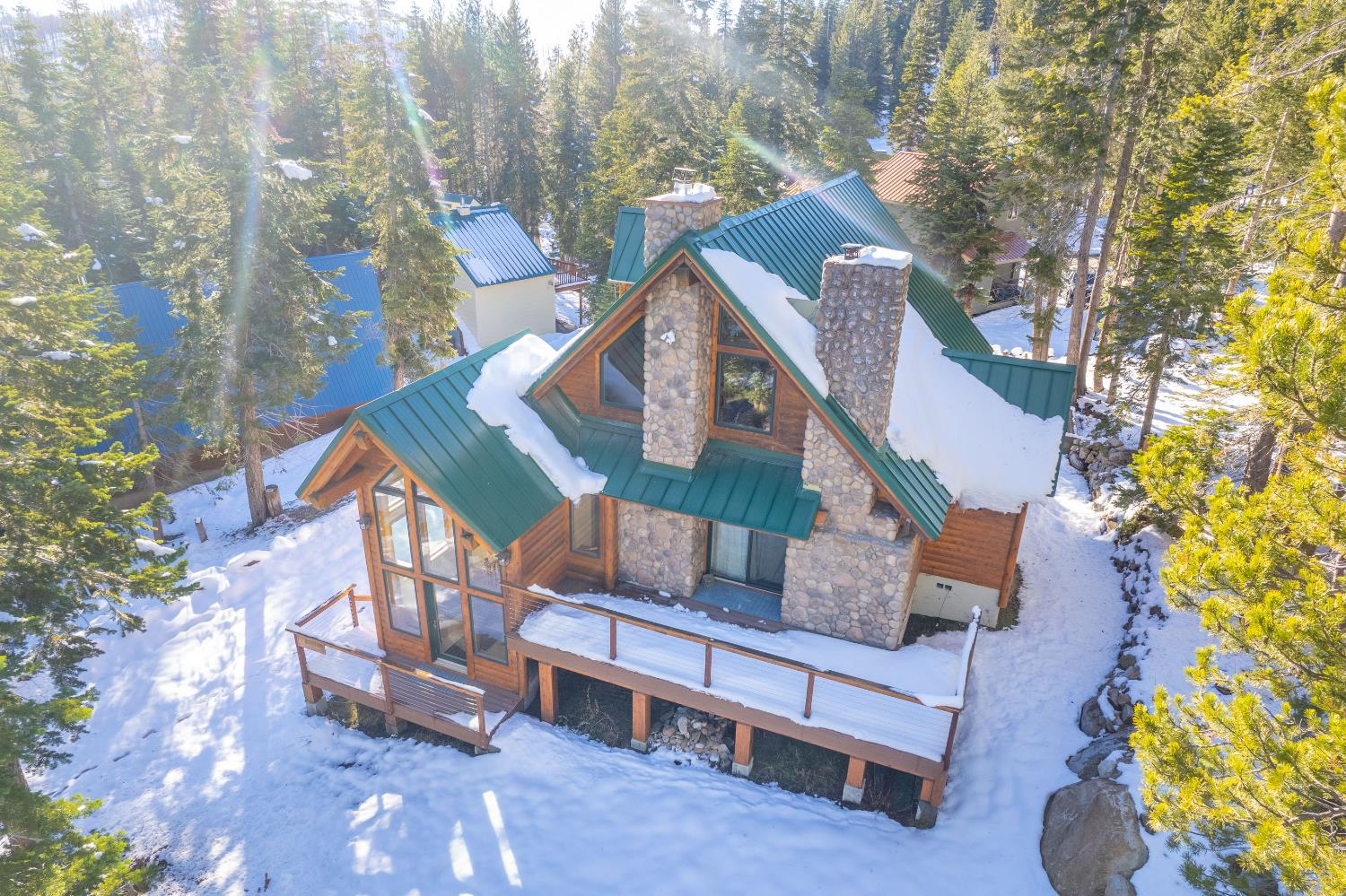 55578 Cordwood Road Shaver Lake, CA 93664 - Photo 39 of 59 a front view of a house with a yard