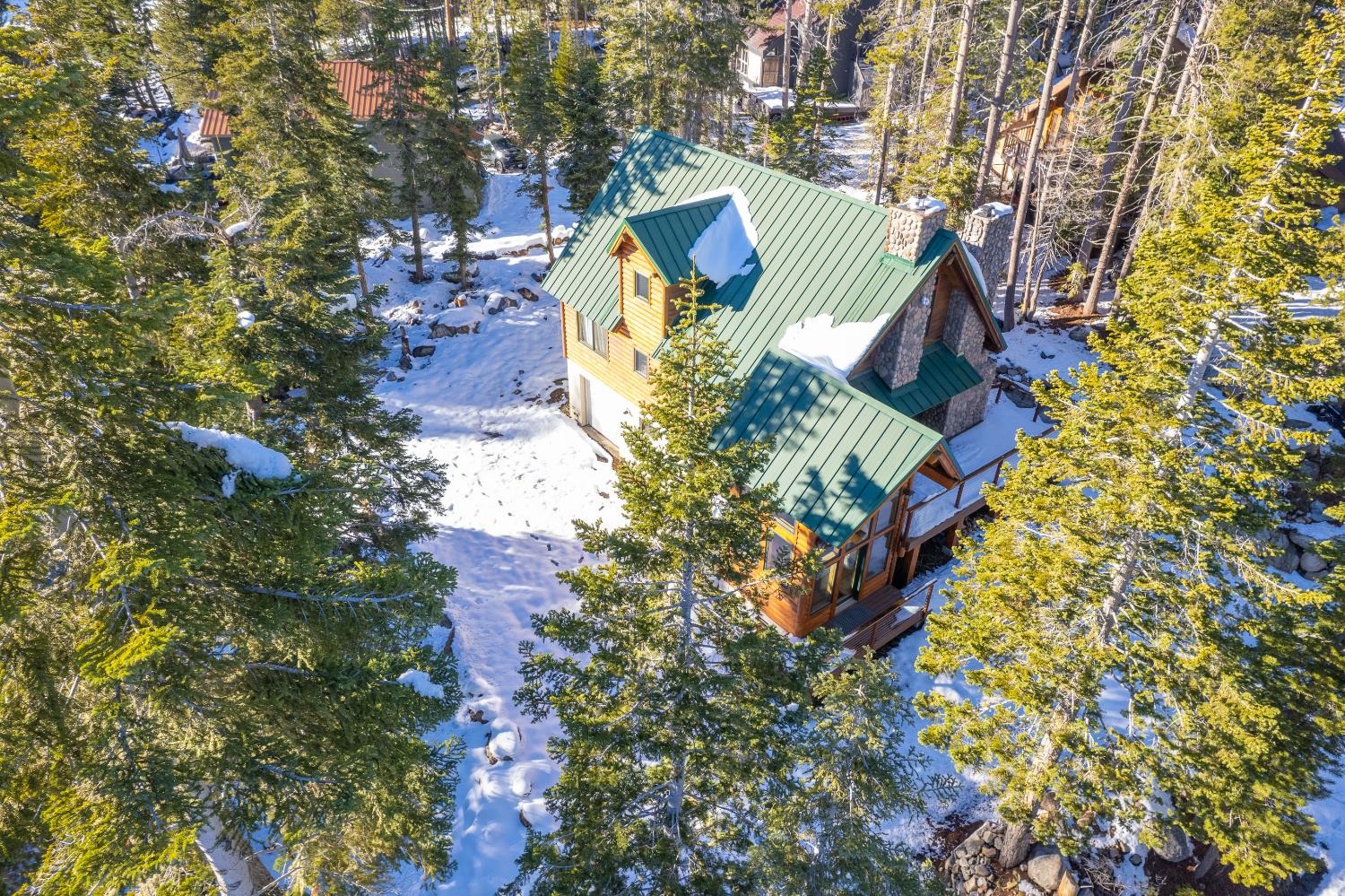 55578 Cordwood Road Shaver Lake, CA 93664 - Photo 52 of 59 an aerial view of a houses with yard