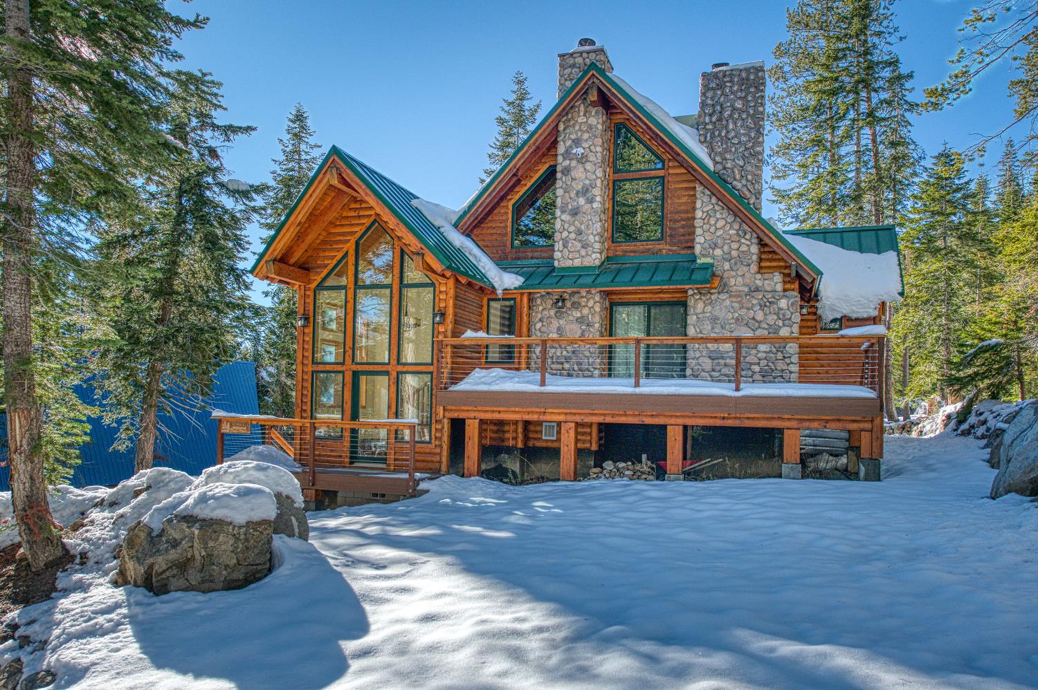 55578 Cordwood Road Shaver Lake, CA 93664 - Photo 55 of 59 a front view of a house with a yard