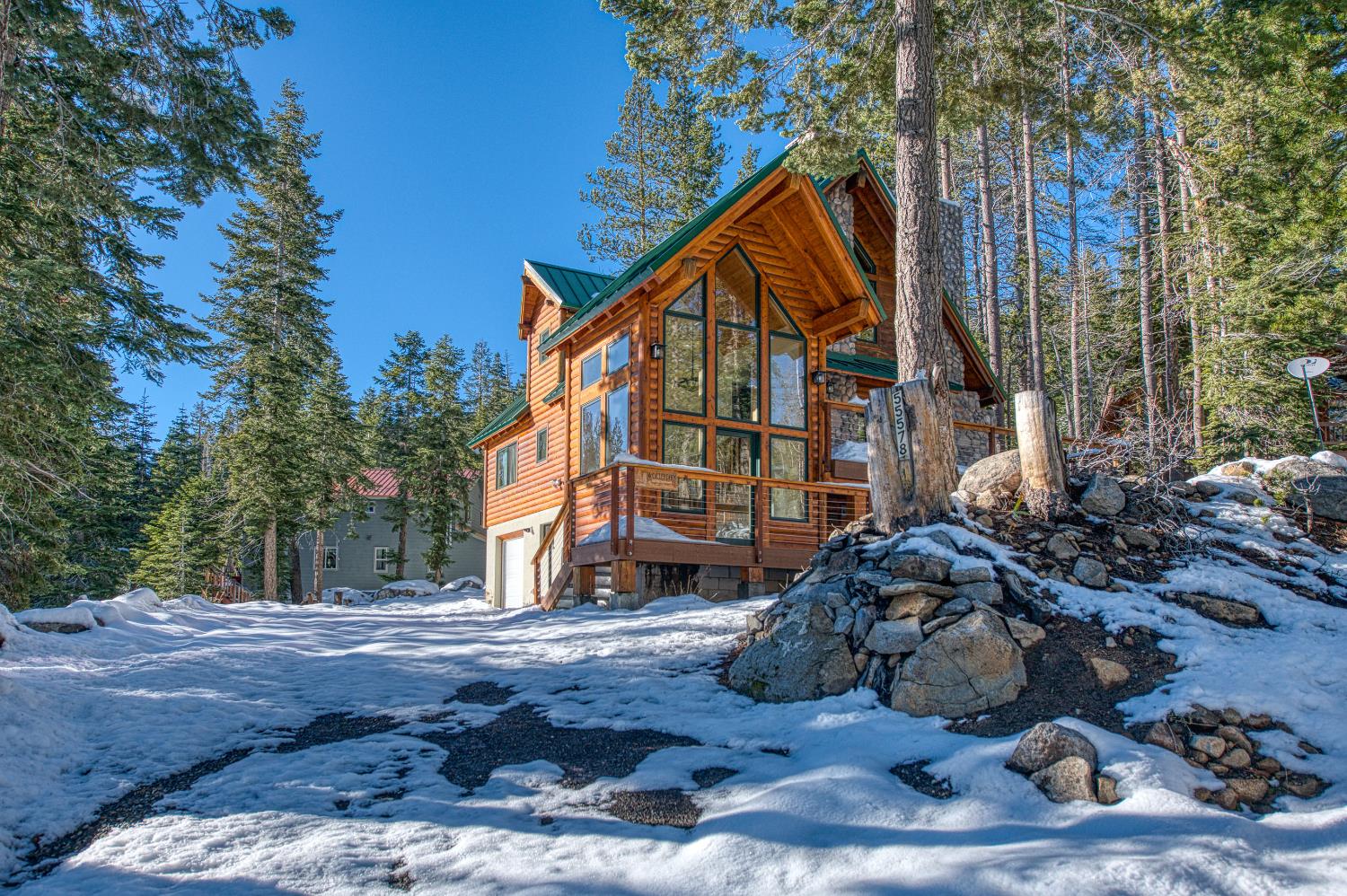 55578 Cordwood Road Shaver Lake, CA 93664 - Photo 57 of 59 a view of a house with a yard