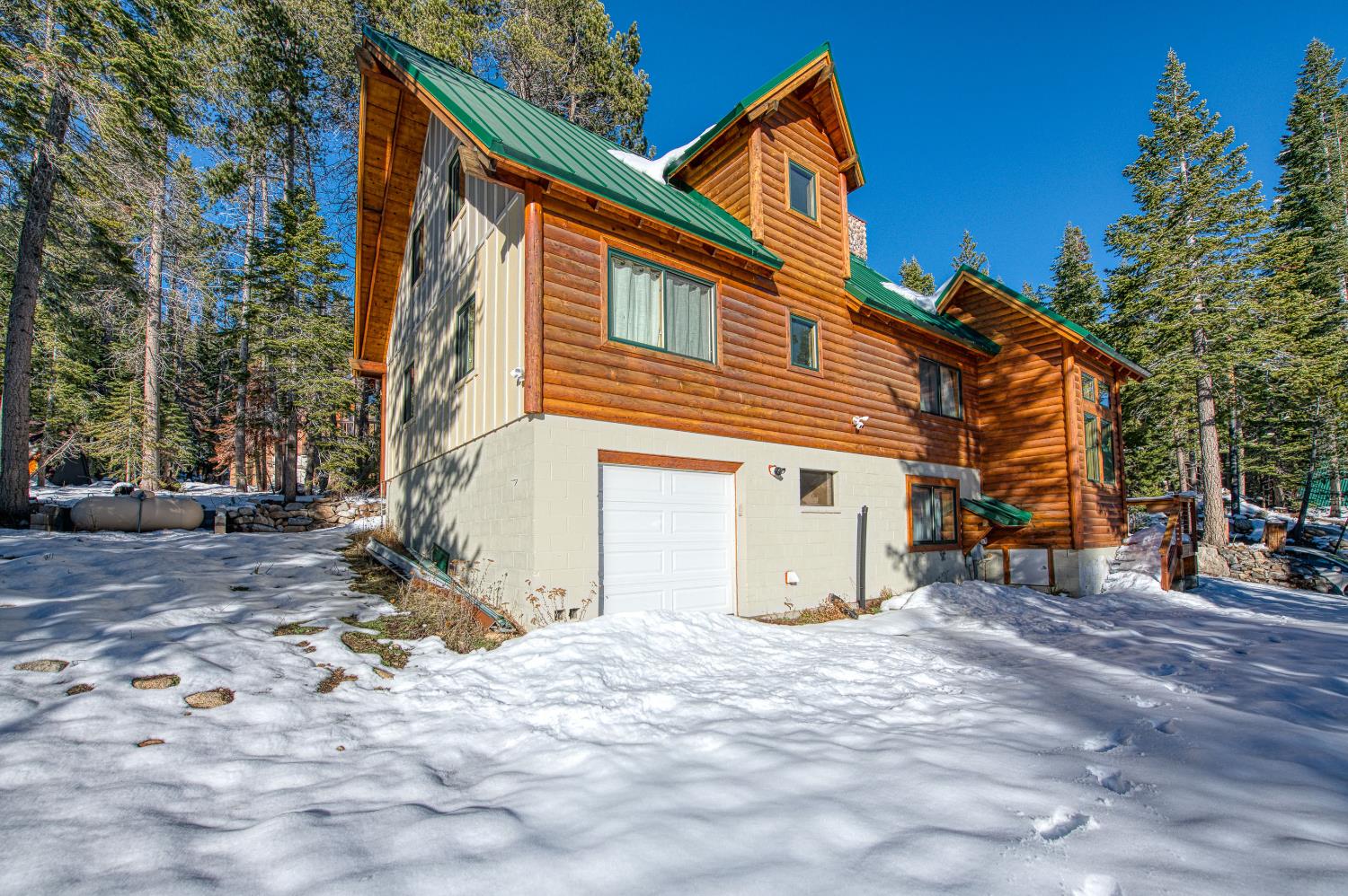 55578 Cordwood Road Shaver Lake, CA 93664 - Photo 59 of 59 a view of a house with a yard