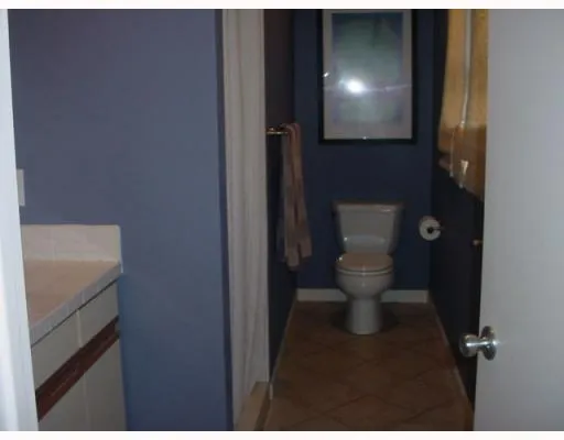a bathroom with a toilet and a sink