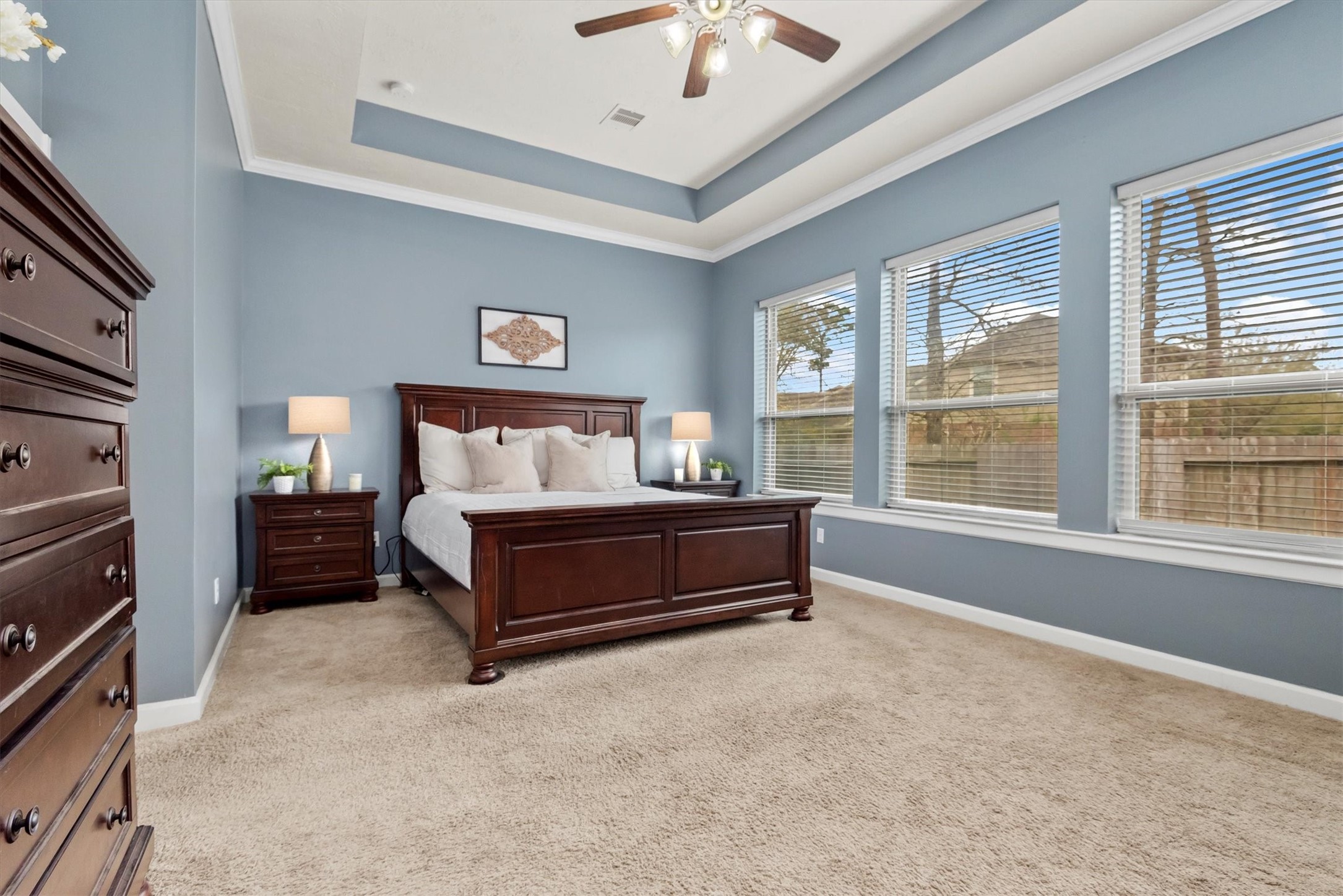 31563 Ember Trail Lane Spring, TX 77386 - Photo 19 of 39 a spacious bedroom with a bed and a large window