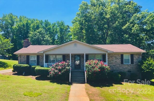 311 Maple Street, Unit 7 Union, SC 29379 - Photo 1 of 34 a front view of a house with yard and large trees