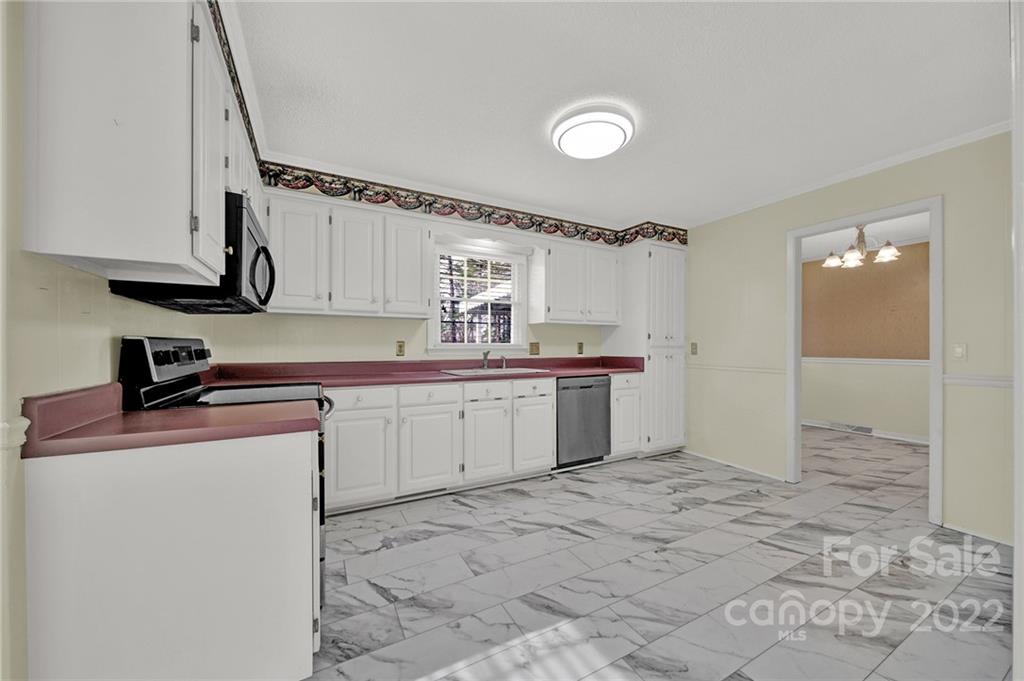 311 Maple Street, Unit 7 Union, SC 29379 - Photo 13 of 34 a kitchen with a sink cabinets and appliances