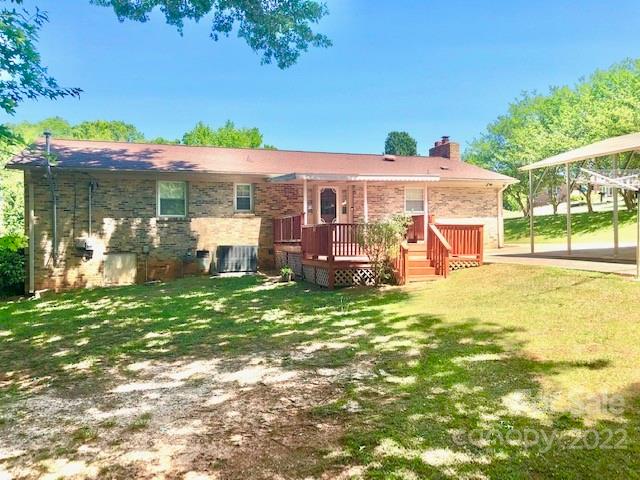 311 Maple Street, Unit 7 Union, SC 29379 - Photo 27 of 34 a view of a house with a backyard porch and sitting area