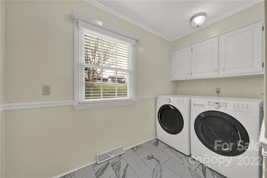 311 Maple Street, Unit 7 Union, SC 29379 - Photo 10 of 34 a utility room with sink dryer and washer