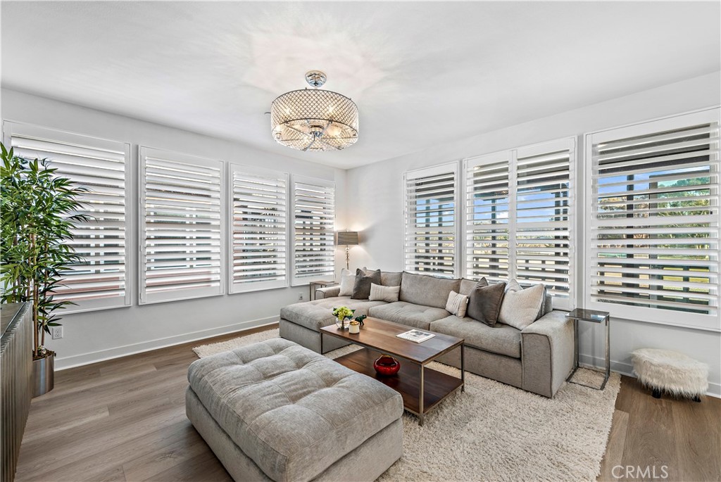 1309 Doheny Way Dana Point, CA 92629 - Photo 18 of 45 a living room with furniture and a large window