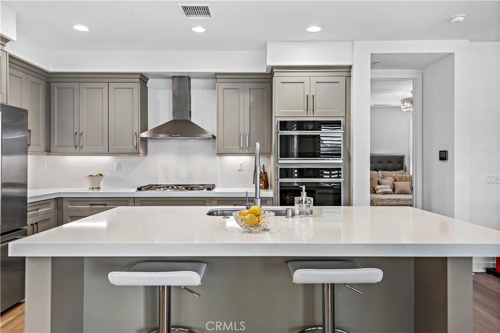 1309 Doheny Way Dana Point, CA 92629 - Photo 8 of 45 a kitchen with stainless steel appliances a sink and a stove