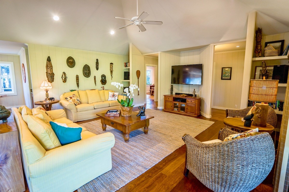 4412 Aku Road Hanalei, HI 96714 - Photo 7 of 30 a living room with furniture kitchen view and a flat screen tv