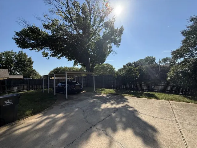 a view of house with patio outdoor seating area