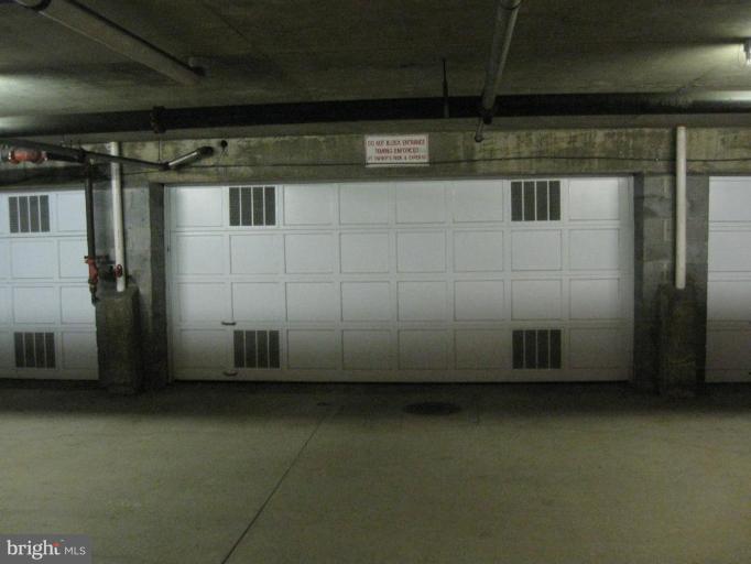 3094 South Glebe Road, Unit 3094 Arlington, VA 22206 - Photo 24 of 26 A view of the garage with the garage door closed.