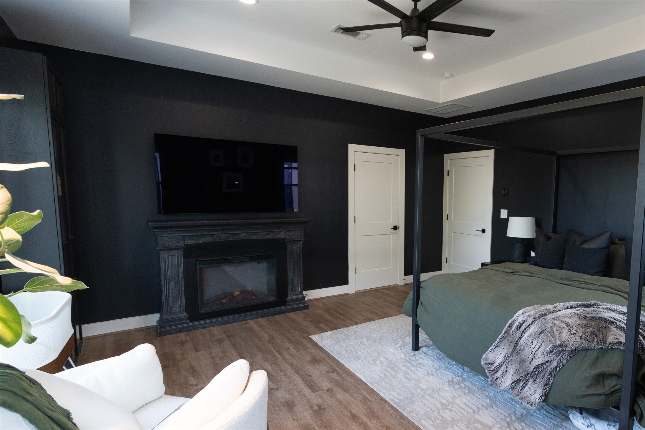 1206 Hamblen Street Houston, TX 77009 - Photo 14 of 28 a bedroom with a bed and a fireplace