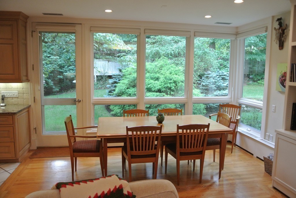 423 Concord Road Weston, MA 02493 - Photo 11 of 30 a view of a dining room with furniture window and wooden floor