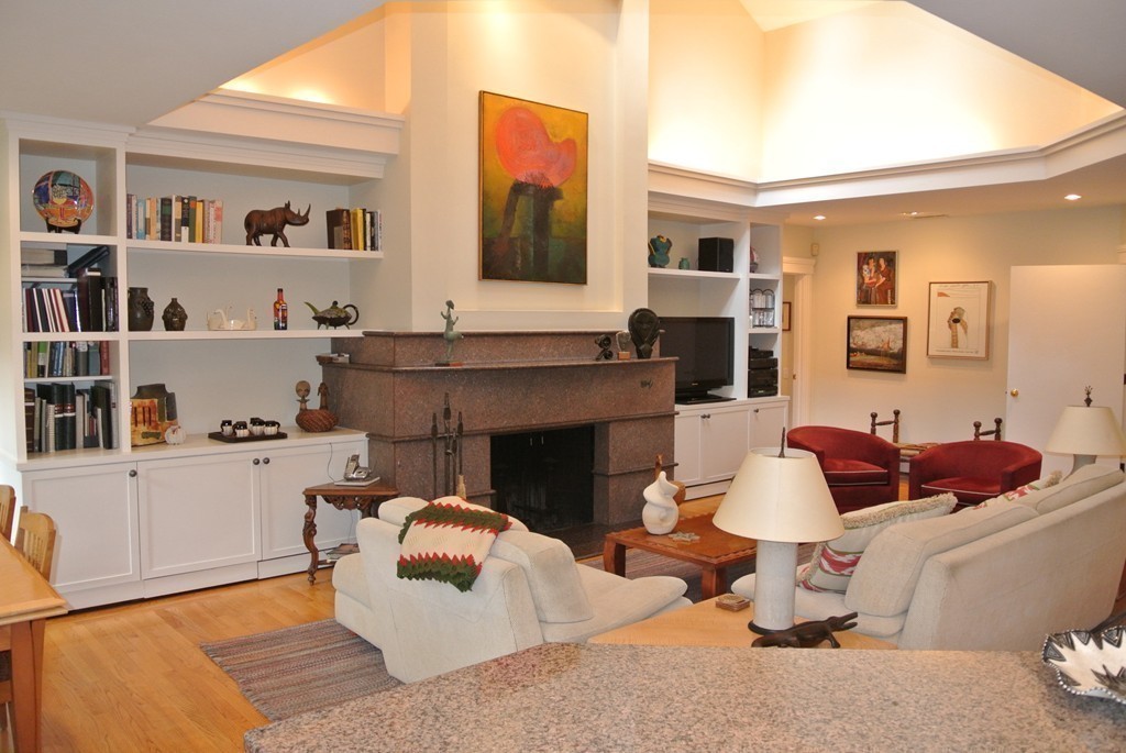 423 Concord Road Weston, MA 02493 - Photo 13 of 30 a living room with furniture and a fireplace