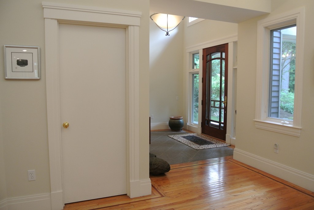 423 Concord Road Weston, MA 02493 - Photo 2 of 30 a view of livingroom with hardwood floor and hallway