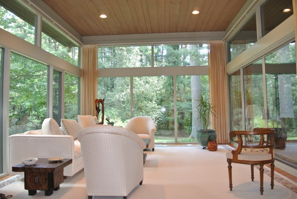423 Concord Road Weston, MA 02493 - Photo 5 of 30 a living room with patio and a yard