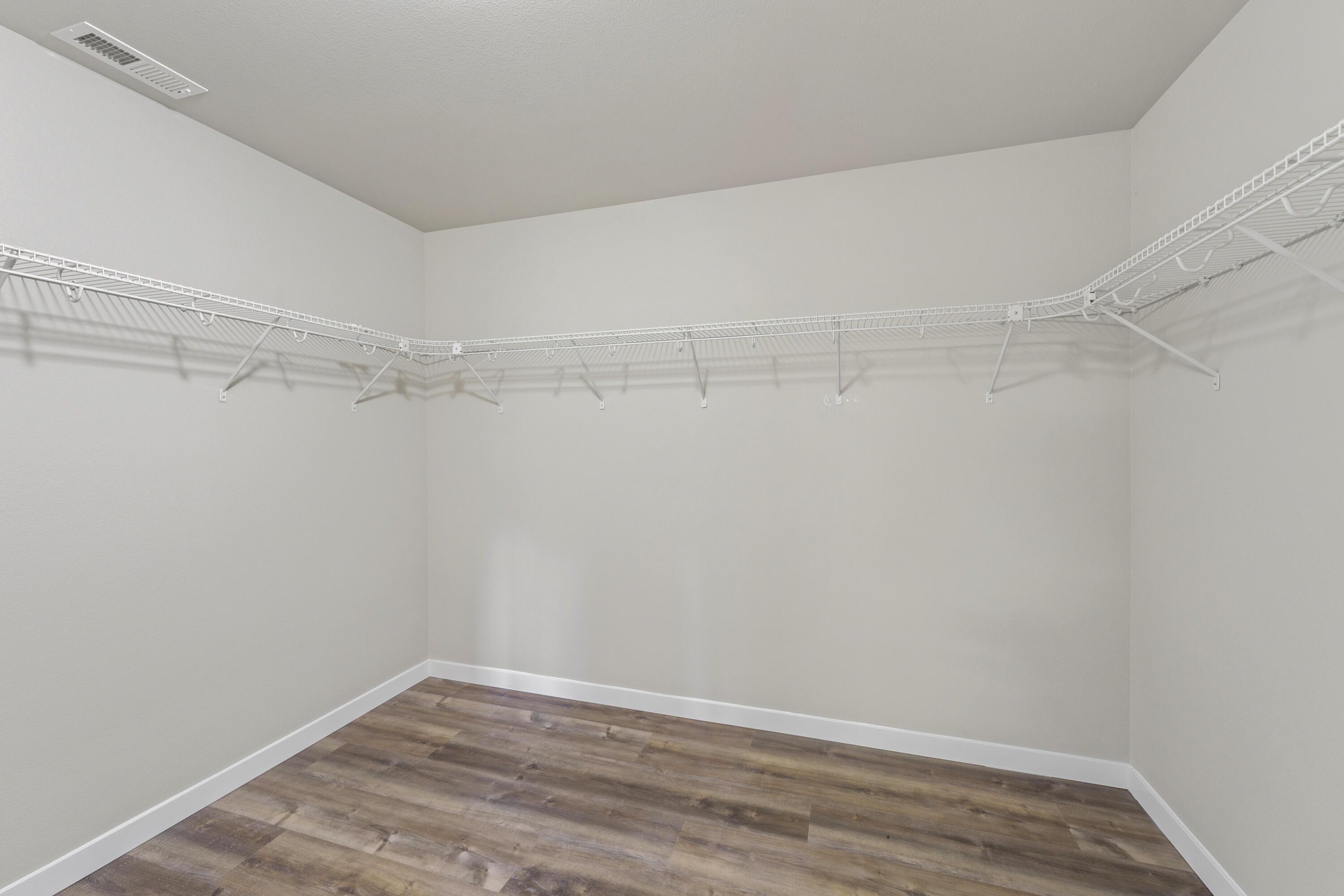 21189 Ritz Place Bend, OR 97702 - Photo 28 of 37 a view of an empty walk in closet