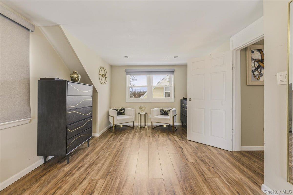 3309 Nelson Street Wantagh, NY 11793 - Photo 17 of 39 a view of a livingroom with furniture wooden floor and window