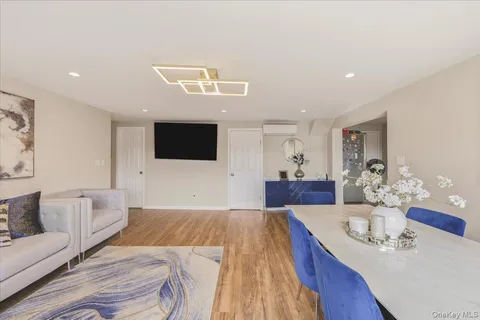 a living room with a couch and a flat screen tv