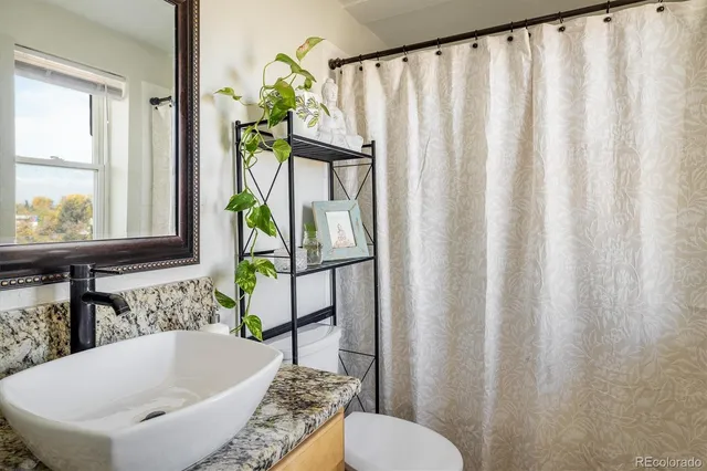 a bathroom with a sink and a bathtub