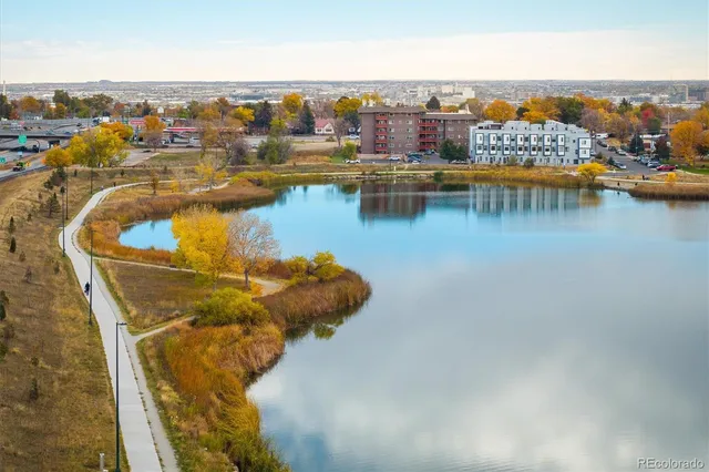a view of a lake with a city