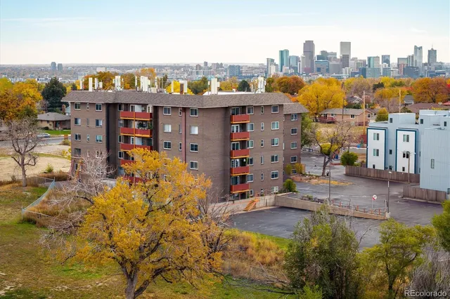 a view of a city with tall buildings