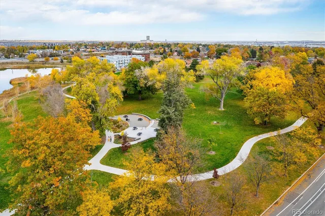 an aerial view of a residential houses with outdoor space