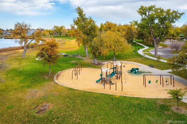 a view of swimming pool with a yard